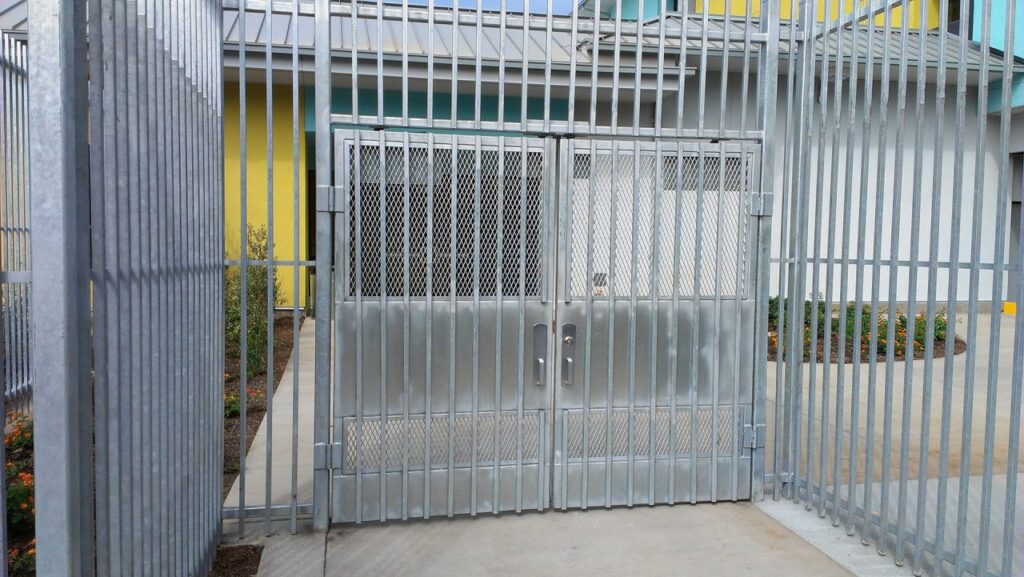 Steel mesh security gate at a school campus entrance