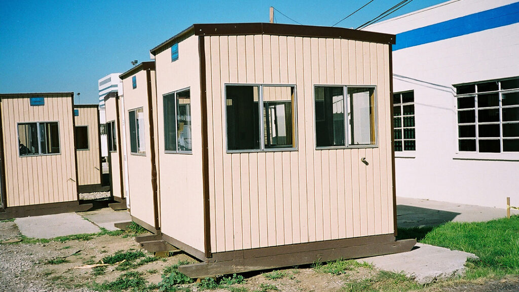 Row of prefabricated guard booths installed at a municipal operations facility