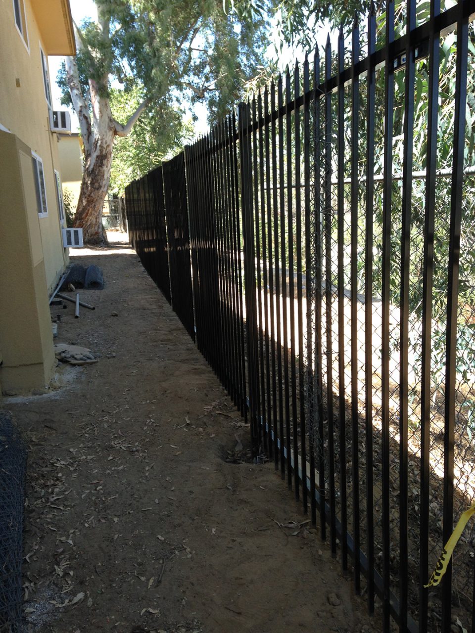 Wrought iron perimeter fencing installed by Lobby Traffic Systems