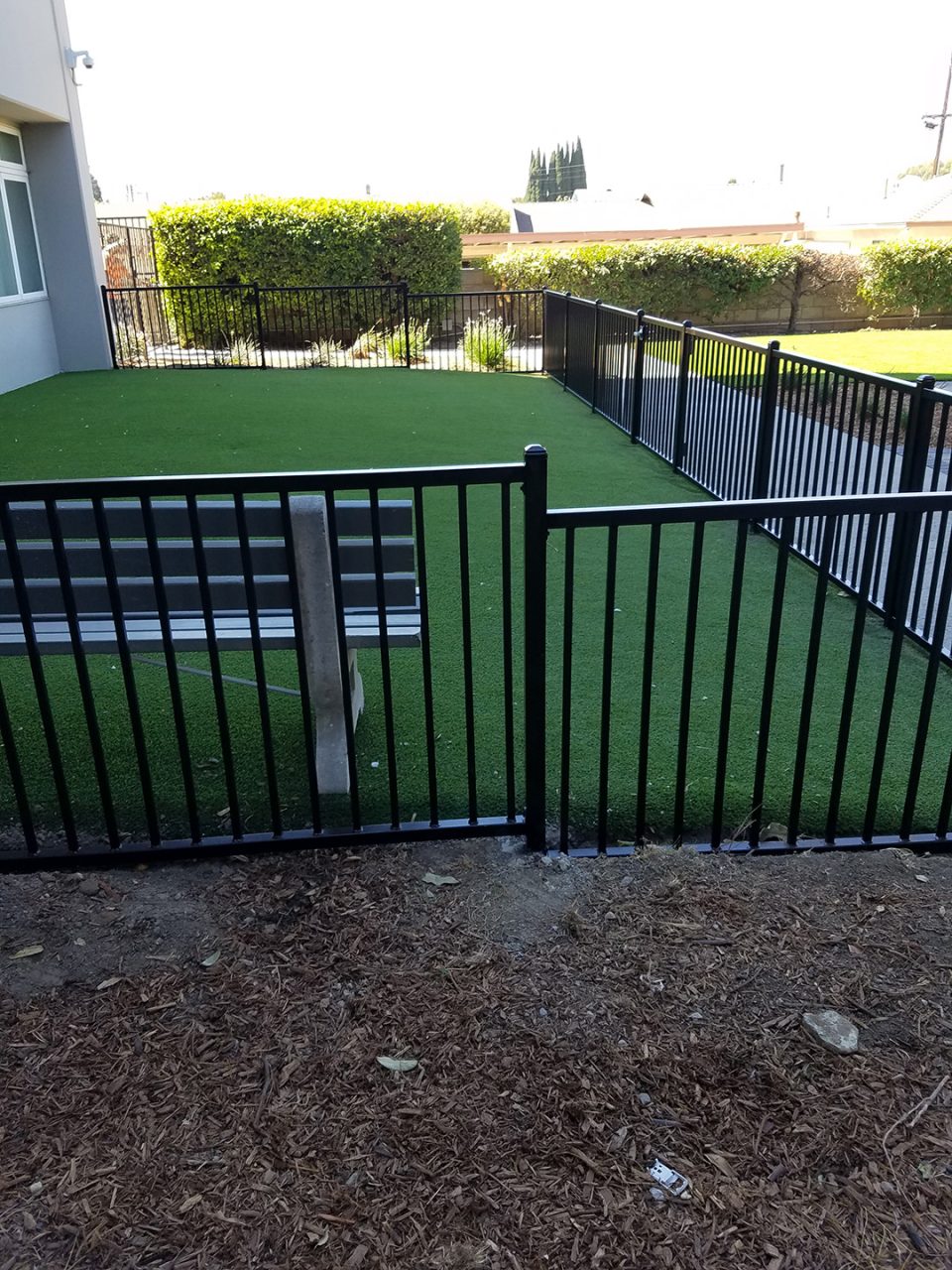 Commercial wrought iron fence installation by Lobby Traffic Systems